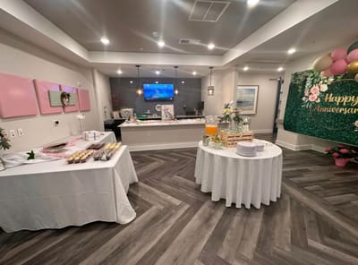 Decorative setup for an anniversary celebration in a common area