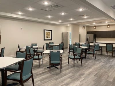 Bright dining room with tables and chairs