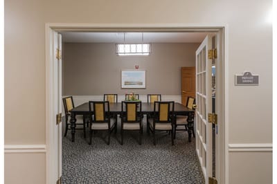 A private dining room set for a meal