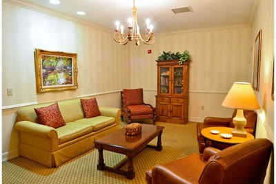 Cozy common area with seating and artwork