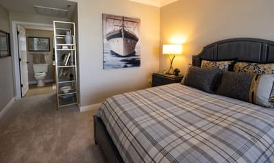 Comfortable bedroom with modern decor in a senior living facility