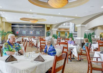 Residents enjoying a meal in the dining room