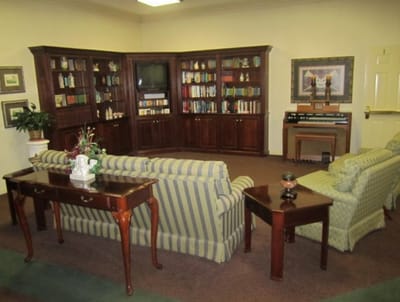 Common area with bookshelves and seating