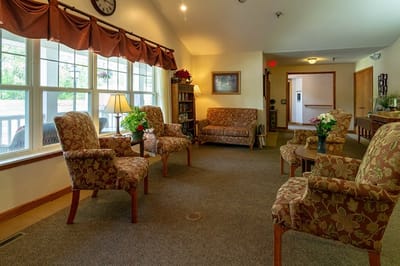 Common area with chairs and natural light