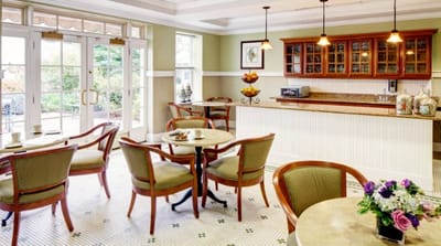 Bright dining room with tables and chairs
