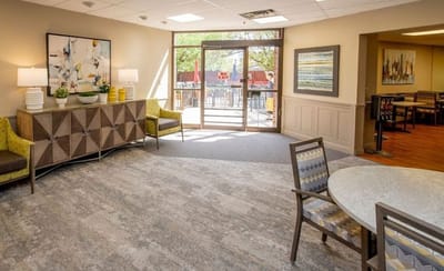 Bright common area with seating and decor