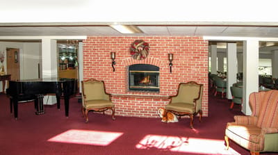 Cozy common area with a fireplace and seating