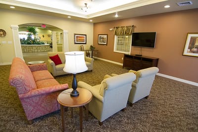 Comfortable common area with seating and TV