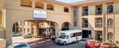 Exterior view of Brookdale Central Paradise Valley with shuttle bus