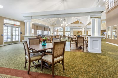 Interior view of a common area with tables and chairs