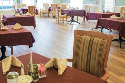 Dining area with tables set for meals