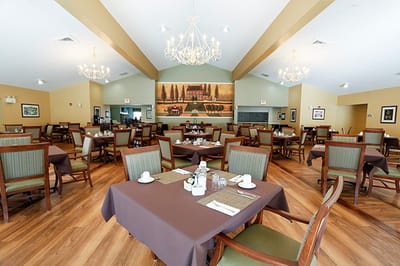 Dining room with tables set for a meal
