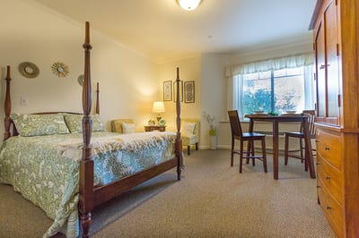 Cozy private resident room with a dining area