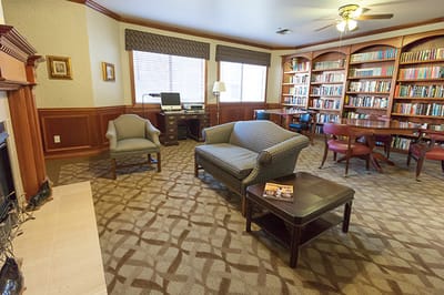 Cozy interior of a facility library with books and seating