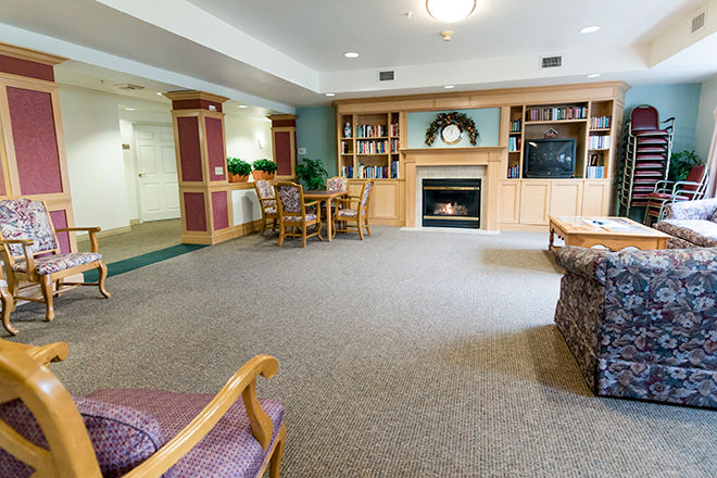Common area with seating and a fireplace