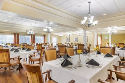 Bright dining room with neatly set tables