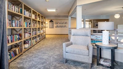 Interior view of a cozy reading area with bookshelves