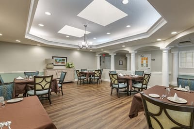 Dining area with tables set for a meal