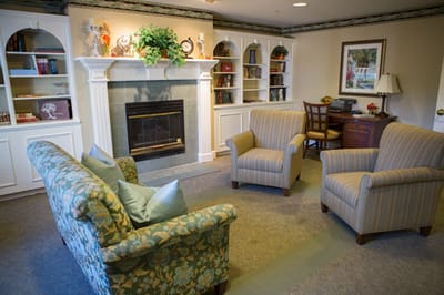 Common area with seating and a fireplace