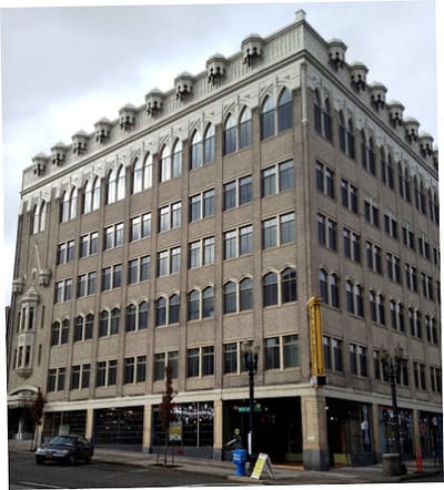 Exterior view of a large building with architectural details