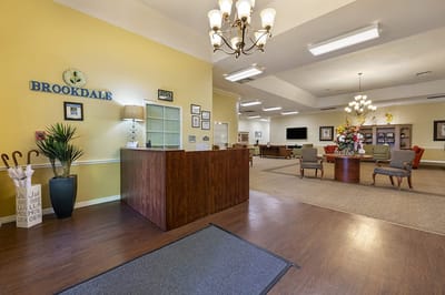 Bright interior lobby with flowers and seating