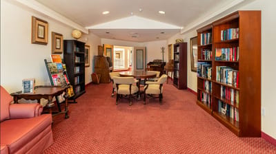 Interior of a common area with bookshelves and seating