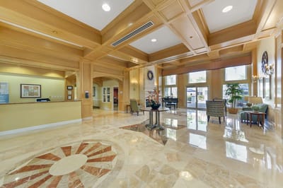 Bright interior lobby with decorative flooring and seating