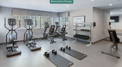 Interior view of a fitness area with exercise equipment