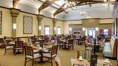 Dining area with tables set for meals