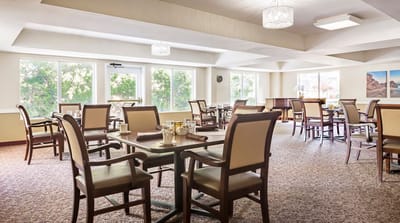 Bright dining room with tables and chairs