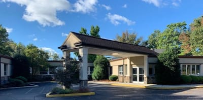 Exterior view of a senior care facility entrance