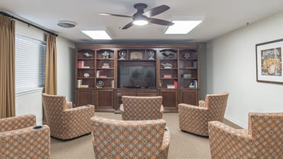 Cozy common area with comfortable seating and TV