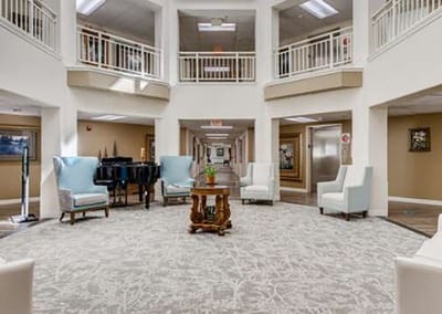 Interior common area with seating and piano
