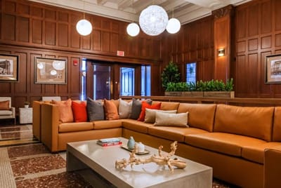 Cozy interior lounge area with large leather sofa