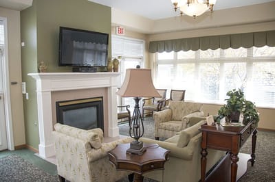 Cozy common area with seating and fireplace