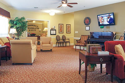 Interior lounge area with seating and television