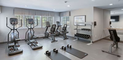 Fitness area with exercise equipment and free weights