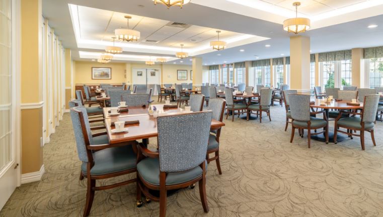 Bright dining room with tables and chairs