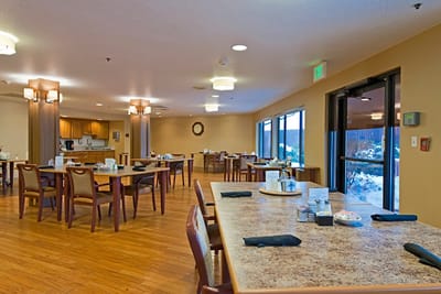 Dining room with wooden tables and chairs