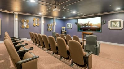 Interior view of a cozy movie theater with seating