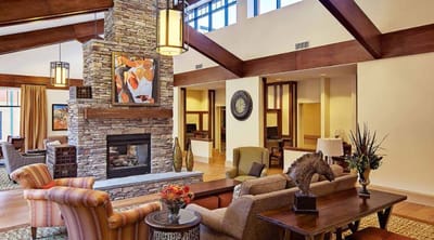 Interior common area with seating and fireplace
