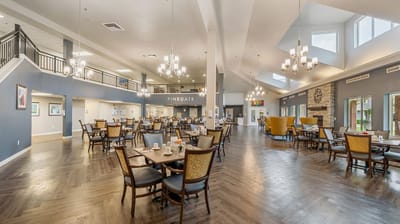 Dining area with tables and chairs in a common space