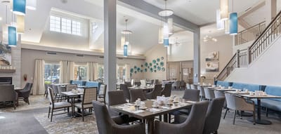 Bright dining area with tables set for meals
