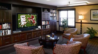 Cozy common area with comfortable seating and a TV
