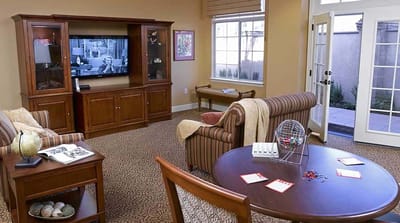 Activity room with seating and a television