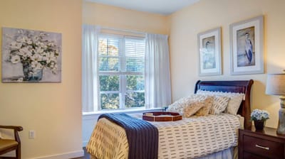 Cozy resident room with bed and decor