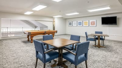 Interior common area with pool table and seating