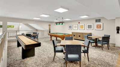 Common area with pool table and seating