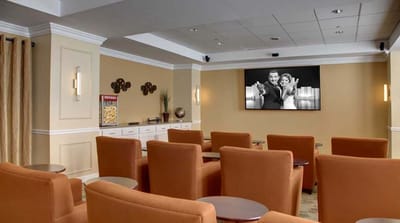 Cozy common area with seating and a television