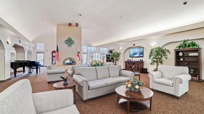 Bright common area with seating and decorations